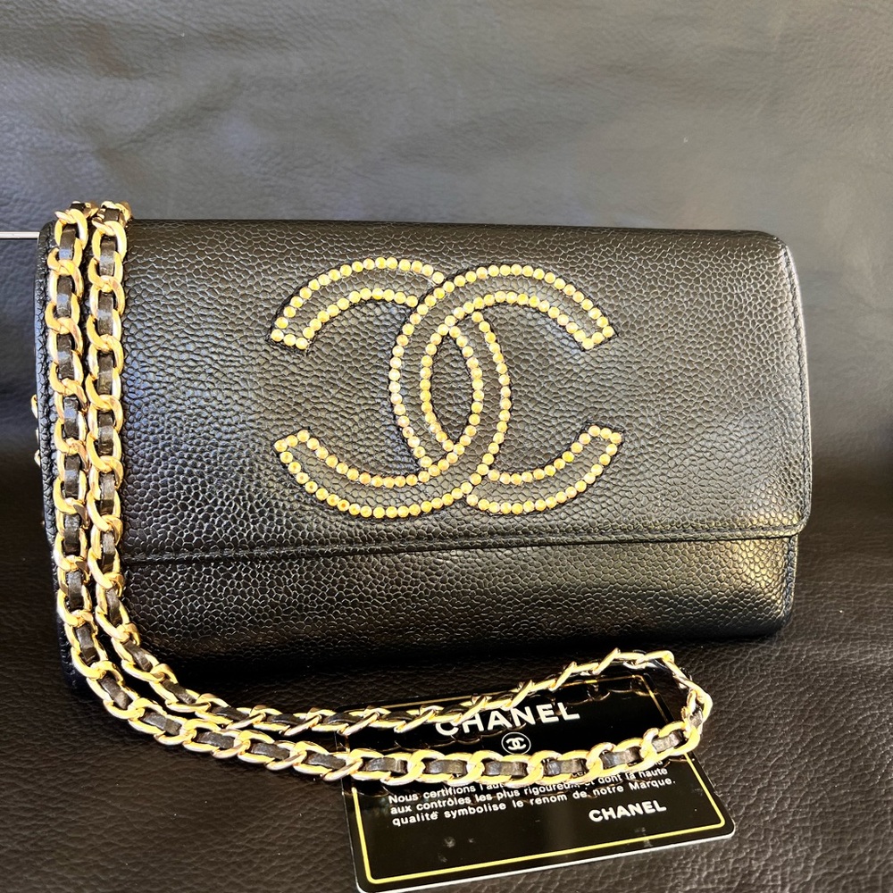 CHANEL Black Caviar crossbody large wallet with chain.